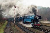 477.043 + 498.022