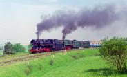 498.104 + 475.1142